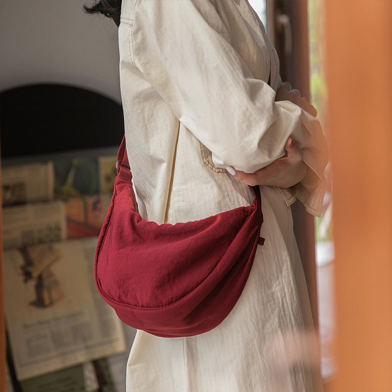 Aurora™ - Half Moon Crossbody Bag