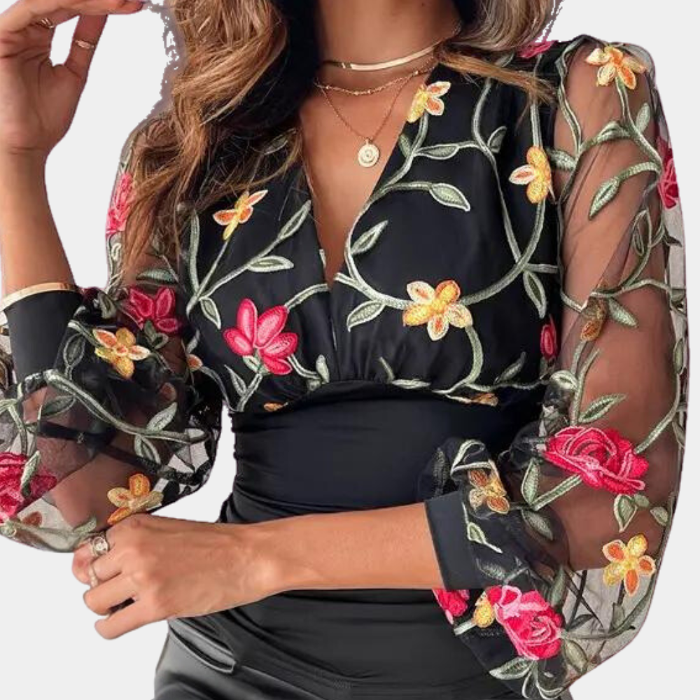 Stylish women's blouse with charming floral embroidery