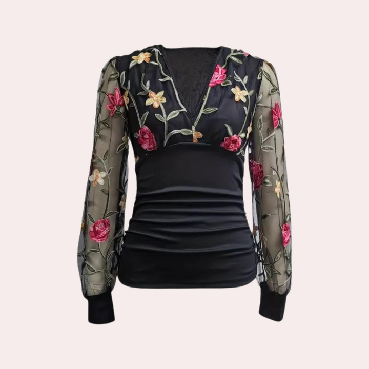 Stylish women's blouse with charming floral embroidery